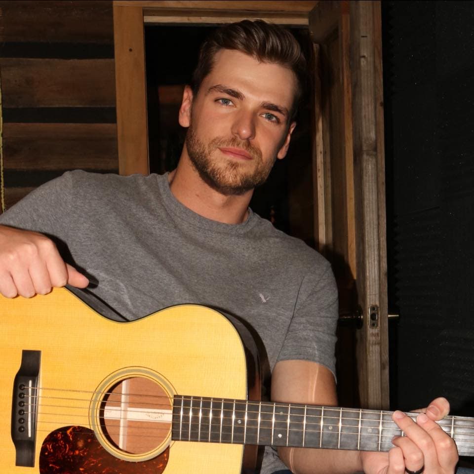 Noah Lynch with guitar